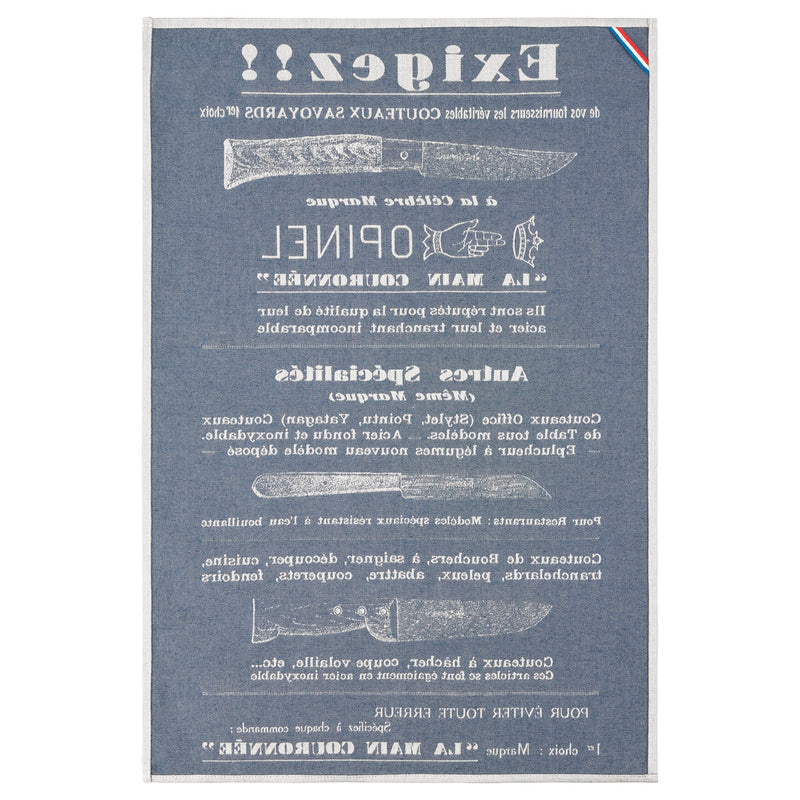 A vintage French dish towel for Opinel Couteaux Savoyards, featuring a light gray background with dark blue text and illustrations of kitchen knives, including the 'Opinel La Main Couronnee' brand.