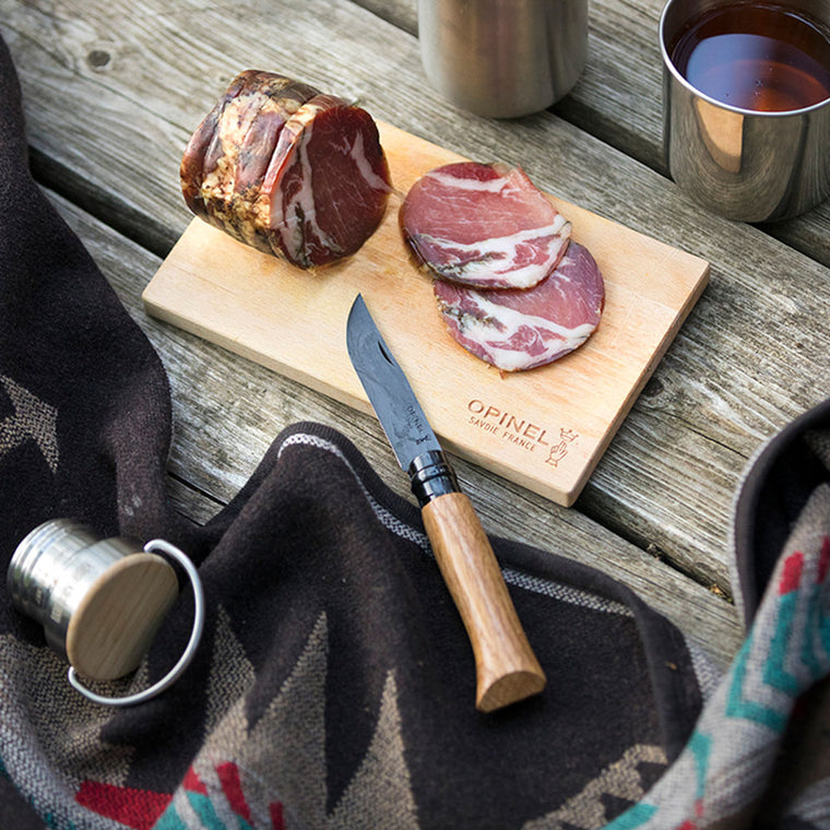 Knife cutting meat