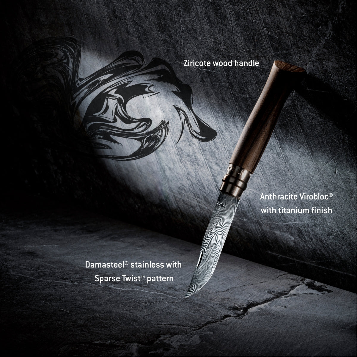 A high-end custom pocket knife with a Damascus steel blade and a ziricote wood handle, shown against a dark textured background with text overlays detailing its materials. Text is saying "Ziricote wood handle" on the top, "Anthracite Virobloc with titanium finish" in the middle and "Damasteel stainless with Sparse Twist pattern" on the bottom